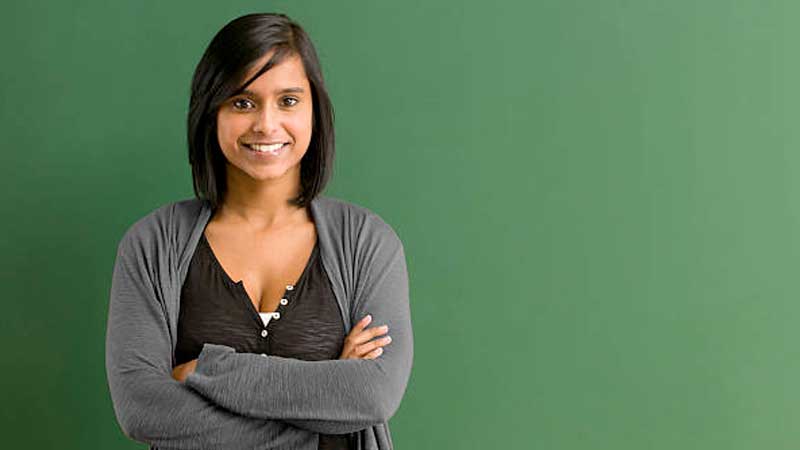 Lady smiling arms folded