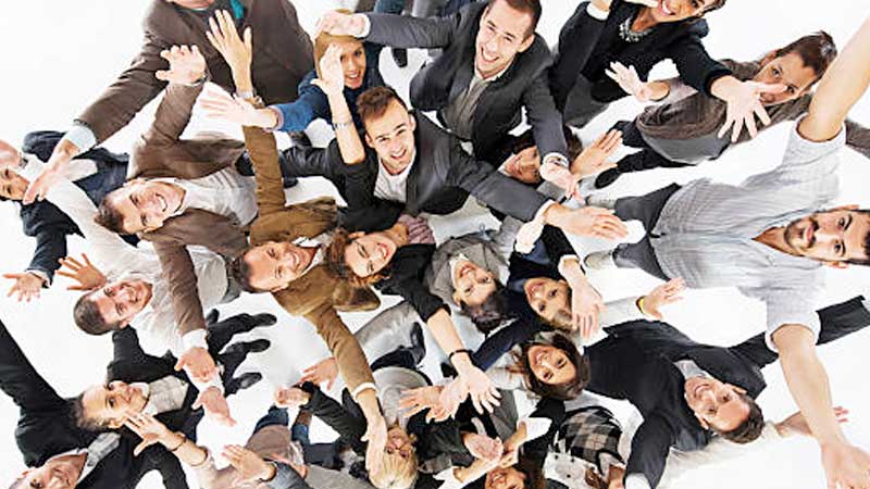 Group of People with arms raised